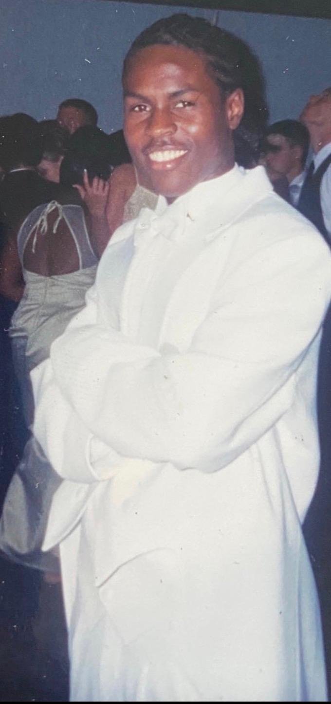 Eugene in a white tuxedo in the early 2000s